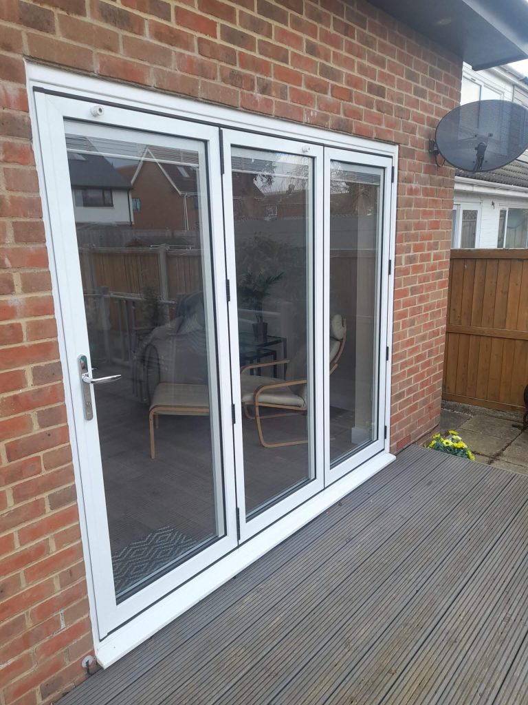 White framed bi-fold door